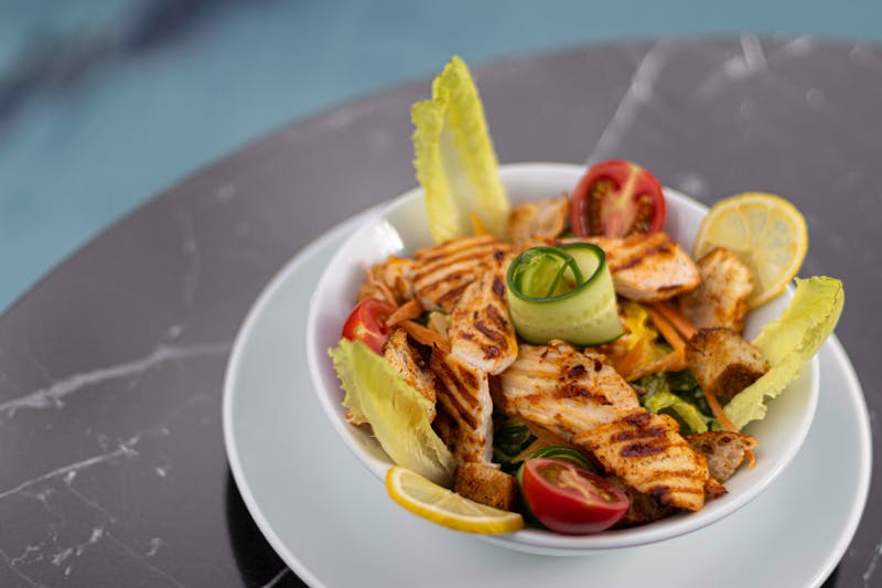 Grilled Chicken Harvest salad with seasonal produce